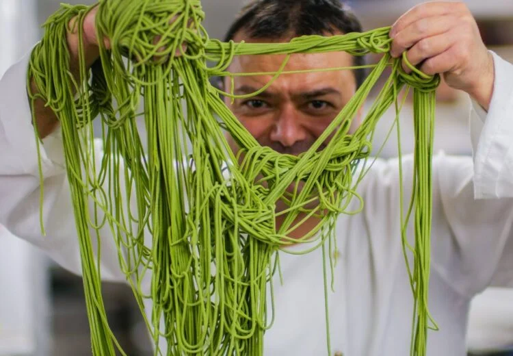 Chef Baldo plating an Italian fine dining dish in London